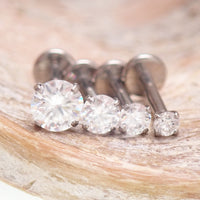 Body Clickers Moissanite implant titanium flatback earrings in 18g, 16g, 14g with 2mm Moissanite stones and 0.9mm thread.