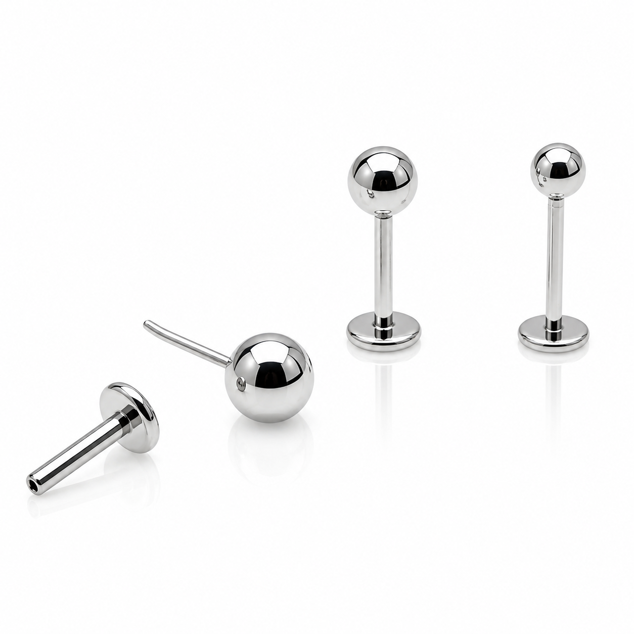 Body Clickers titanium push fit implant earrings with flatback design in 14g to 20g gauges, featuring 3mm or 6mm sizes.