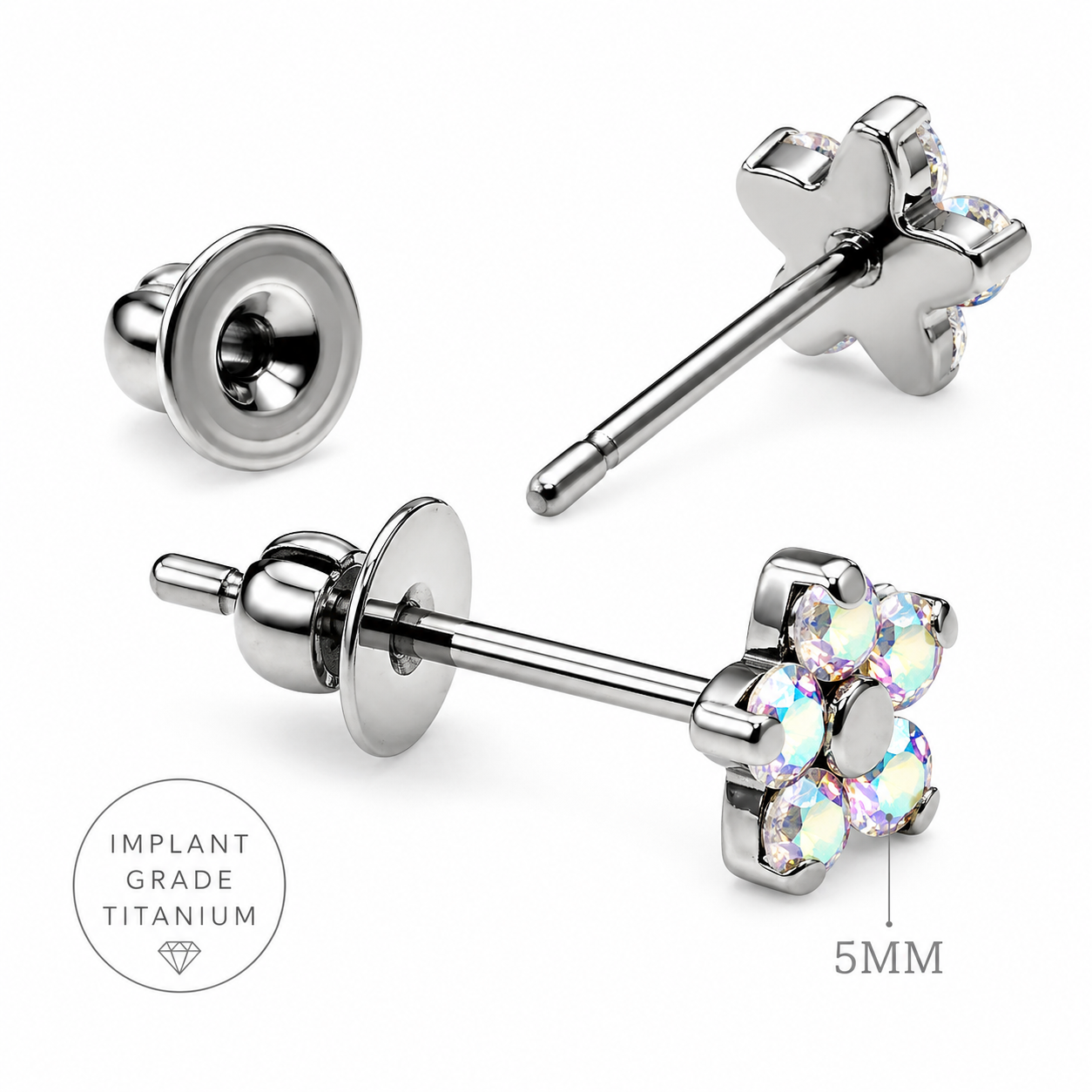 Pair of Body Clickers implant titanium clear CZ flower earrings, 20g, with floral design and transparent stones.