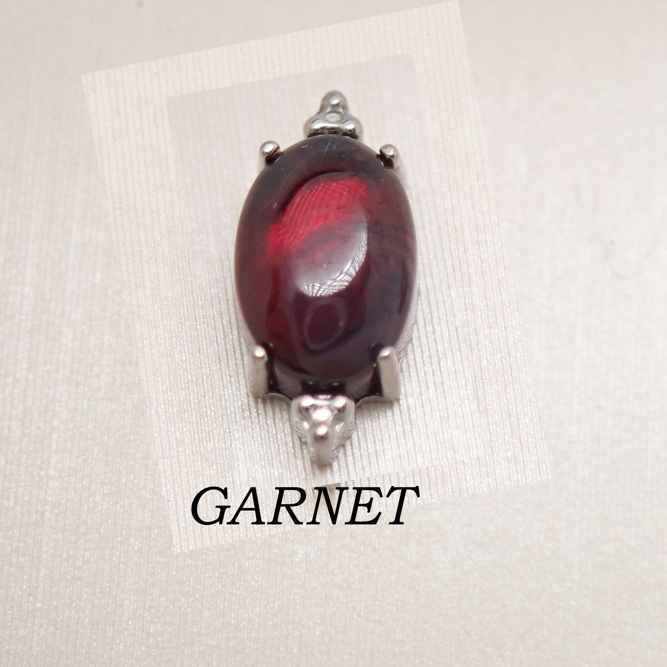 Titanium labret piercing with oval natural garnet stone, flatback design, available in 14g, 16g, and 18g gauges by Body Clickers.