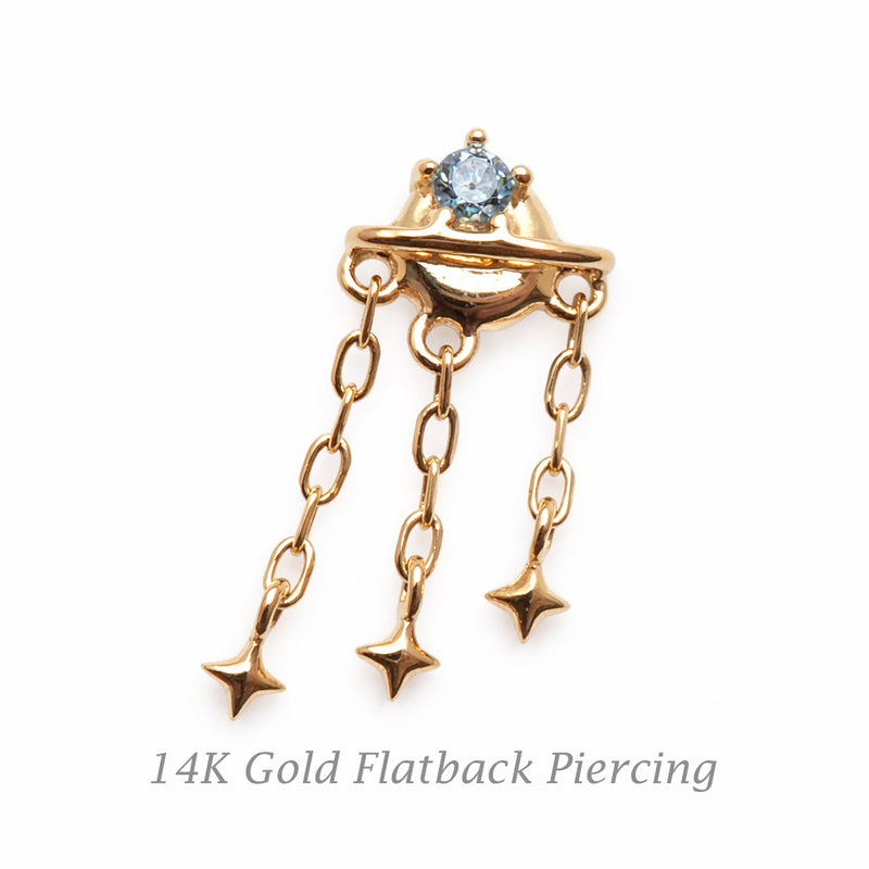 14K gold celestial flatback piercing by Body Clickers, internally threaded in 16g and 14g, featuring a gold planet design.