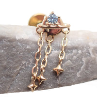 14K gold celestial flatback piercing with a planet and rock design, internally threaded in 14g, 16g, and 18g sizes.