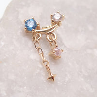 14K gold celestial flatback piercing with star design, internally threaded in 14g, 16g, and 18g sizes by Body Clickers.