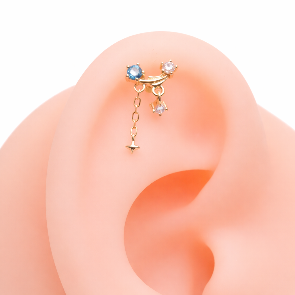 14K gold celestial flatback piercing by Body Clickers, internally threaded in 14g, 16g, and 18g sizes, for ear jewelry.