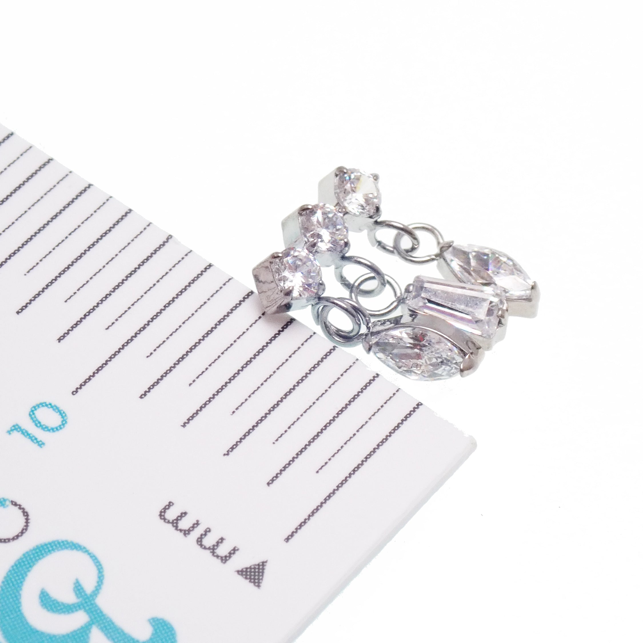 Titanium dangle CZ cluster flatback piercing by Body Clickers, 8mm, internally threaded, suitable for 14g, 16g, and 18g ears.