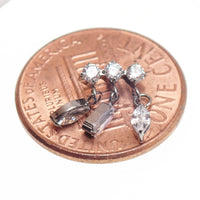 Body Clickers implant titanium dangle CZ cluster flatback piercing with penny design in 14g, 16g, and 18g sizes.