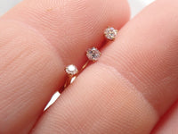 Set of three 16G PVD gold titanium flatback labret studs with internal threading for body piercing by Body Clickers.