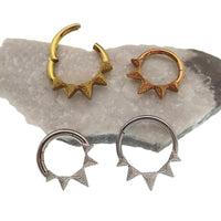 Hammered hinged clicker by Body Clickers in 14g and 16g with point design and 8mm diameter.