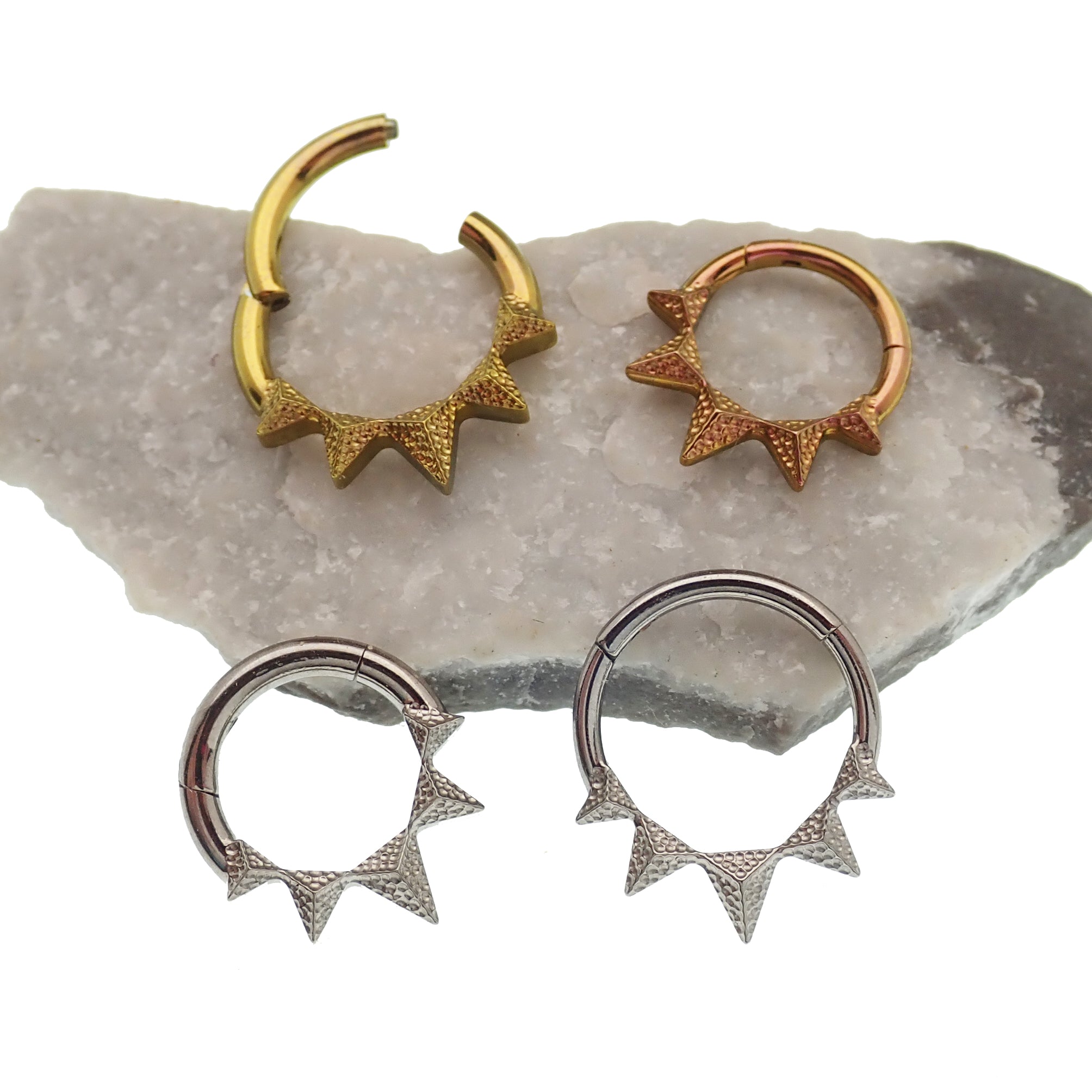 Hammered hinged clicker by Body Clickers in 14g and 16g with point design and 8mm diameter.