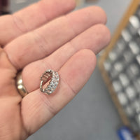 Hinged Chunky CZ Titanium Clicker earring in 16g with 8mm and 10mm sizes, made by Body Clickers, showing the shiny jewelry design.