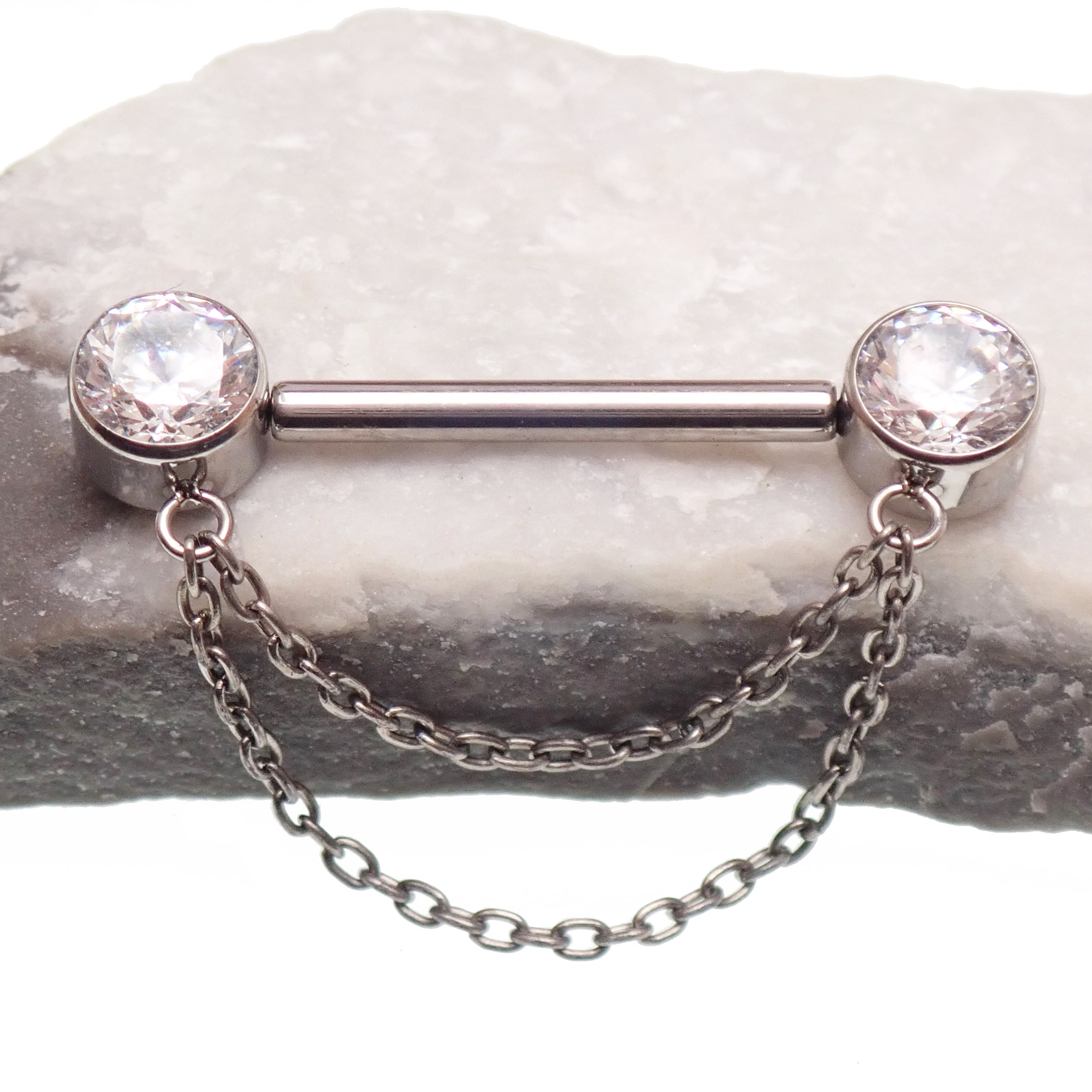 Silver CZ double chain titanium nipple piercing with clear stones, designed for 12g, 14g, and 16g body jewelry by Body Clickers.