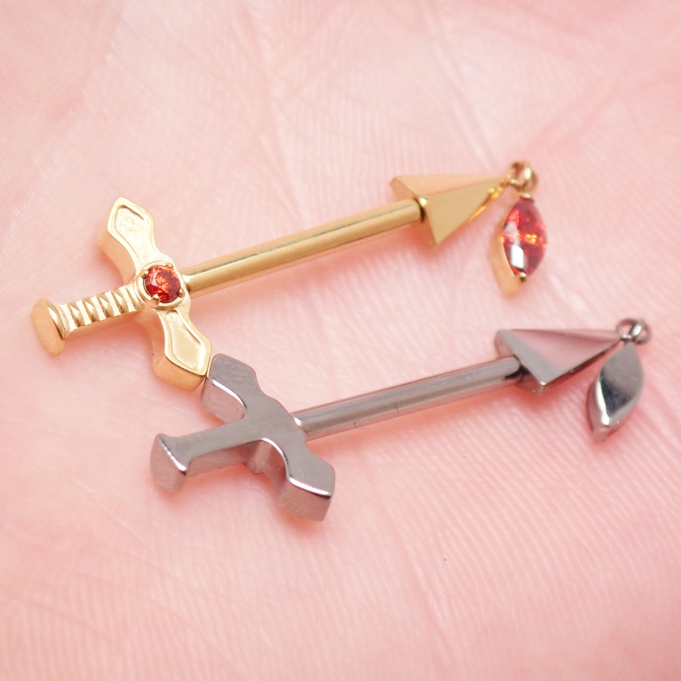 Body Clickers titanium dagger nipple piercing in 16g with detailed design, push-fit style, suitable for 12g, 14g, and 16g.