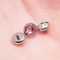 Pink or green CZ dermal top by Body Clickers, titanium round implant with 14g 1.2mm threaded design for dermal piercings.