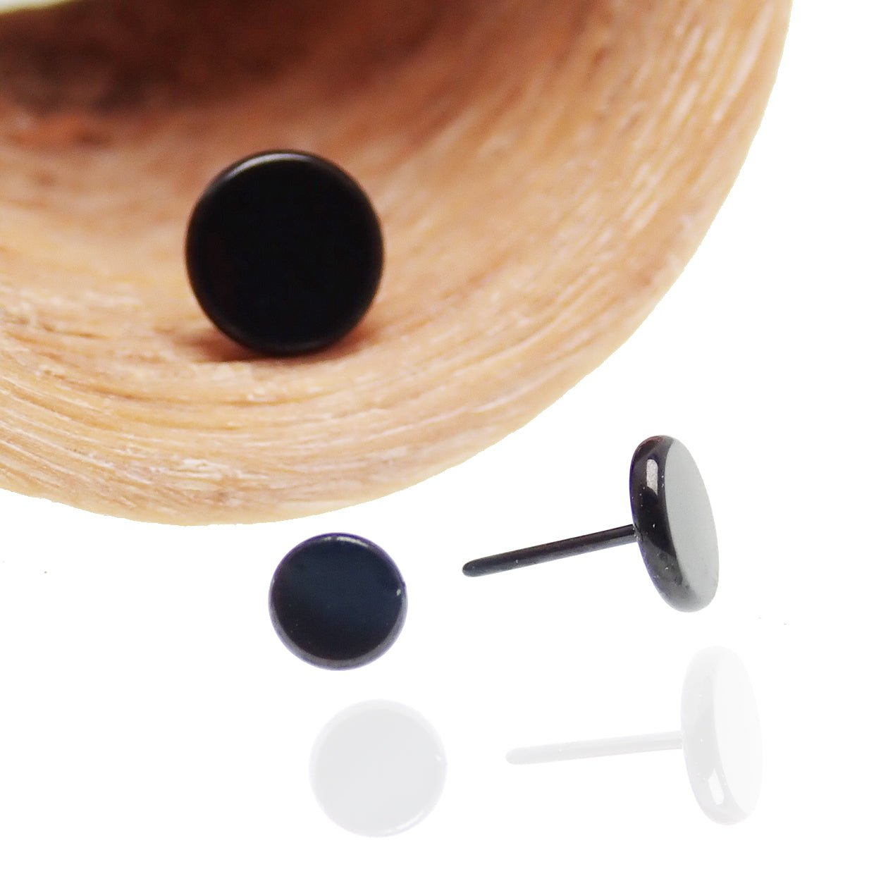 Black PVD titanium push fit disc for body jewelry, featuring a flat back design from Body Clickers.