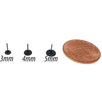 Black PVD push fit titanium disc top for body jewelry, featuring a flat back design by Body Clickers.