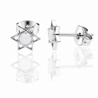 White opal implant titanium star earrings by Body Clickers, 20g, featuring bold star-shaped design and smooth titanium finish.