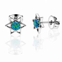 White opal implant titanium star earrings from Body Clickers, 20g, featuring sleek titanium posts and star-shaped design.