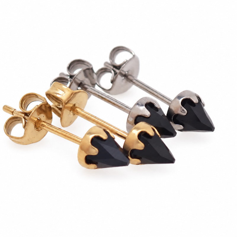 Pair of gold and a pair of silver onyx cone  earrings in a claw setting