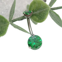 Emerald green CZ prong belly ring body jewelry with 14g gauge on a white background