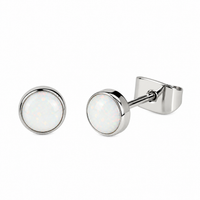 White opal implant titanium earrings in 20g body jewelry, featuring a sleek design by Halobes.