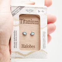 Titanium Opal CZ Crown Earrings by Halobes featuring 20g weight and intricate crown design with sparkling gemstones.