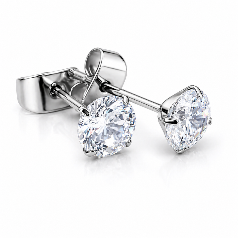 Pair of Halobes titanium implant earrings with 4mm CZ stones, 20g gauge, in a sleek, modern design for pierced ears.