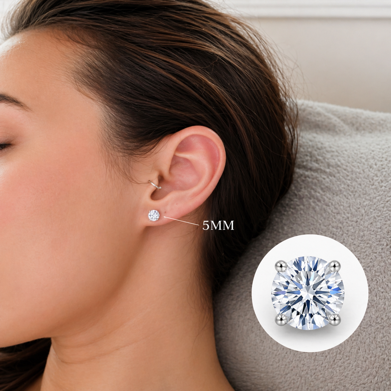 Pair of Halobes titanium earrings with 4mm CZ gemstones, 20g implant earrings, showcasing their sleek design and durable material.