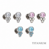 Blue implant titanium earrings with CZ cluster design in a 20g pair by Halobes, stylish and lightweight jewelry for pierced ears.