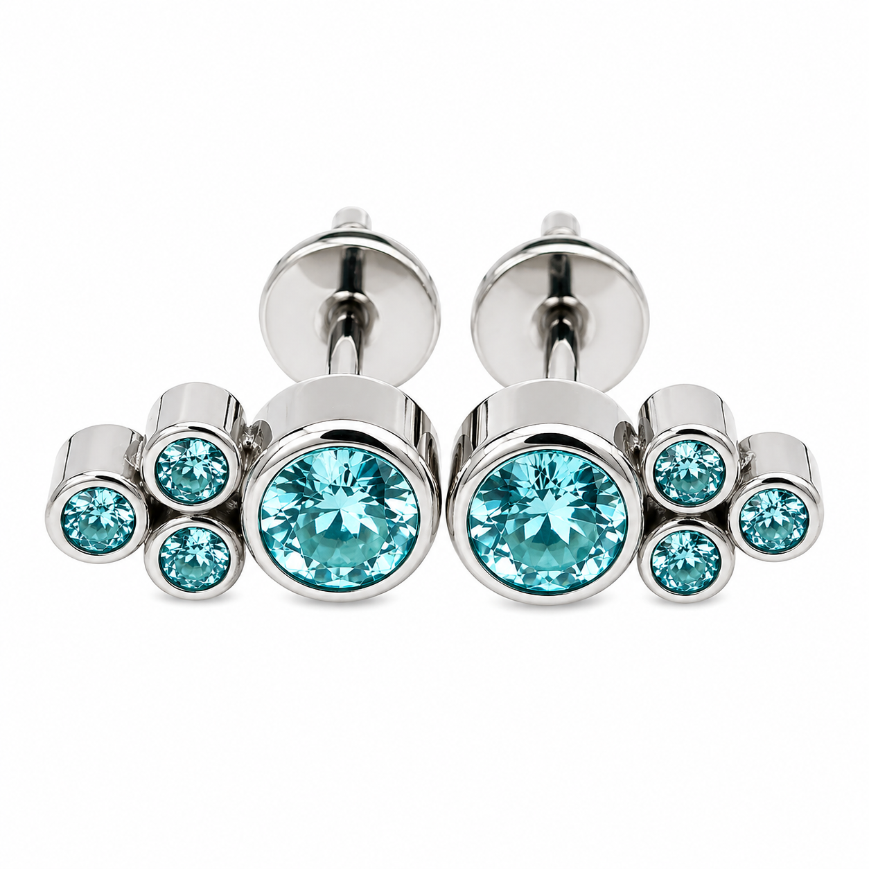 Pair of Halobes blue titanium implant earrings with CZ cluster design, 20g gauge, showcasing stylish and durable jewelry.