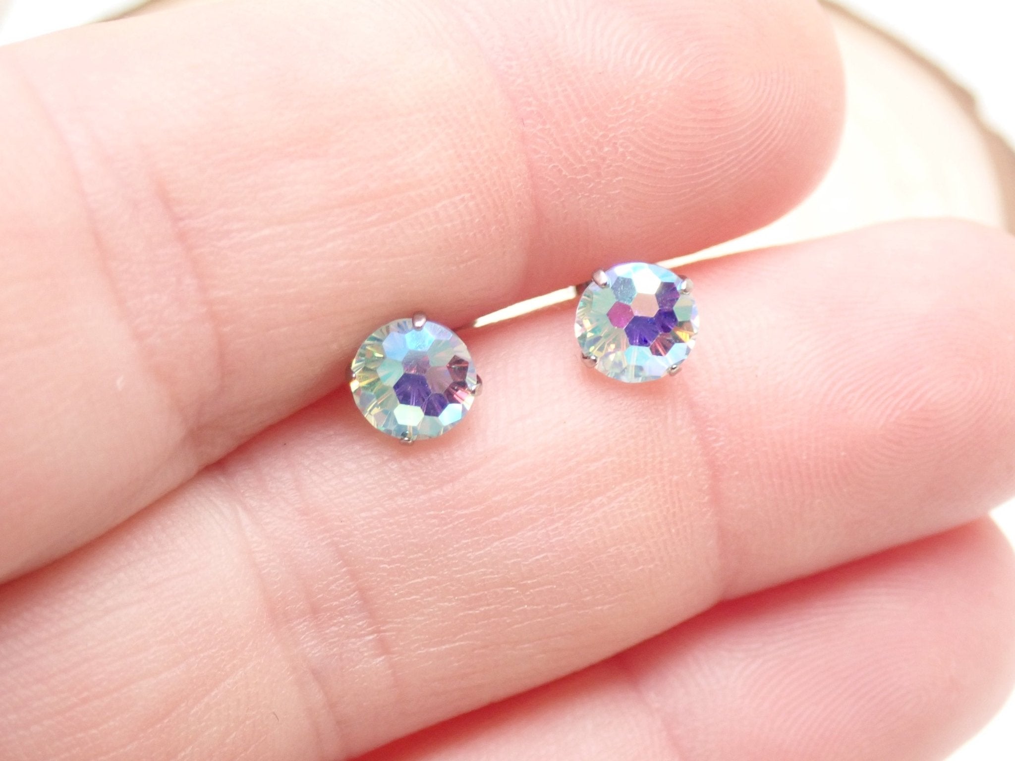CZ Mermaid Blue Titanium Earrings pair by Halobes featuring vibrant blue titanium and intricate mermaid design.
