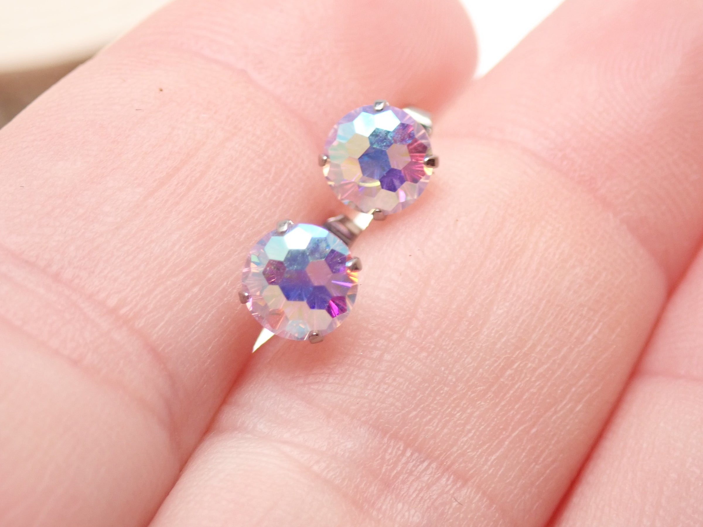 Halobes CZ Mermaid Lavender Titanium Earrings pair featuring intricate mermaid design and vibrant lavender color.