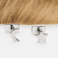 Titanium implant earrings by Halobes featuring moon and star design, 20g gauge, suitable for pierced ears.