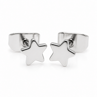 Pair of Halobes titanium implant earrings with star designs, 20g, featuring a sleek, minimalist style for pierced ears.