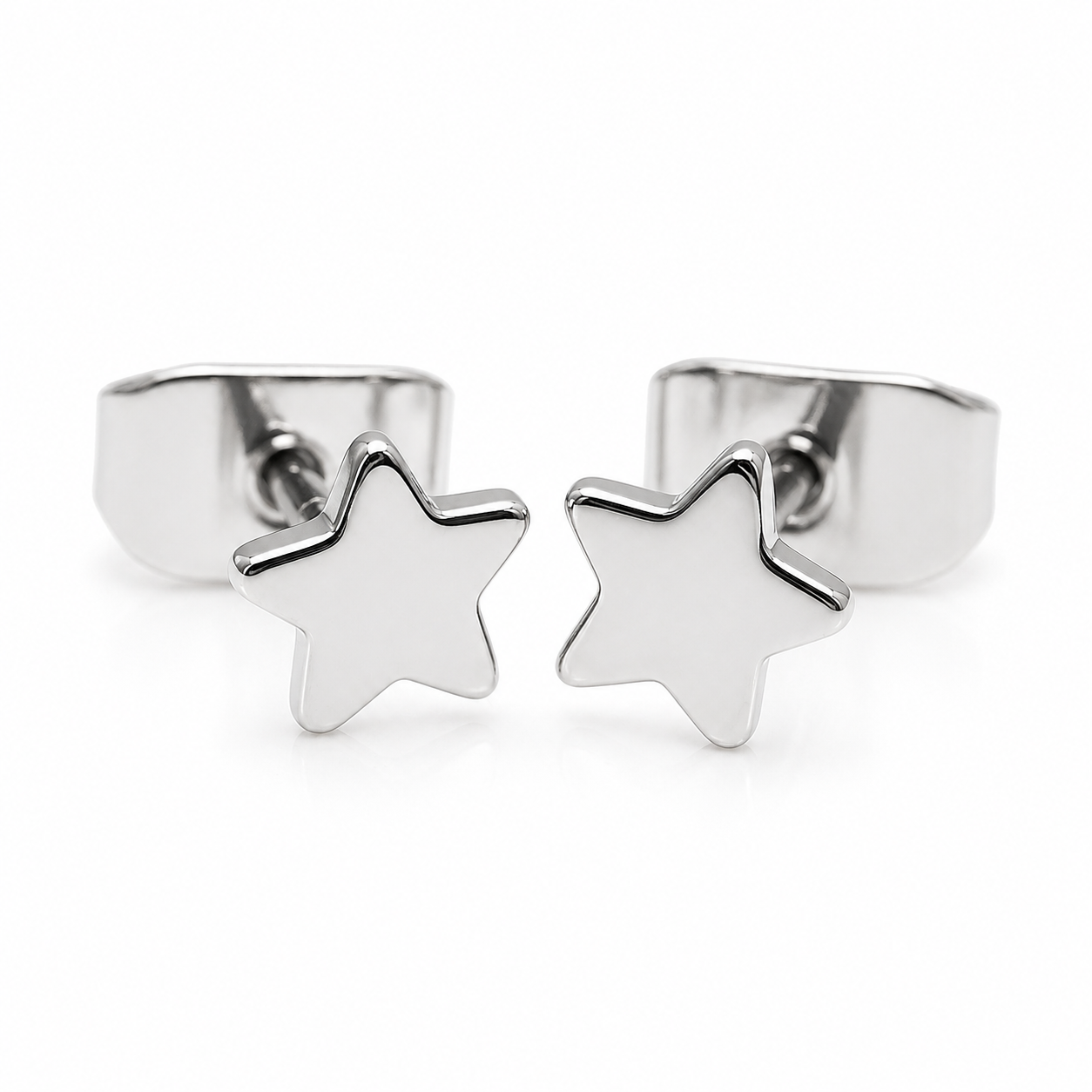 Pair of Halobes titanium implant earrings with star designs, 20g, featuring a sleek, minimalist style for pierced ears.