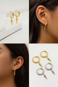 Pair of Halobes titanium earrings with drop spike design, 20g implant style, shown on a white background.