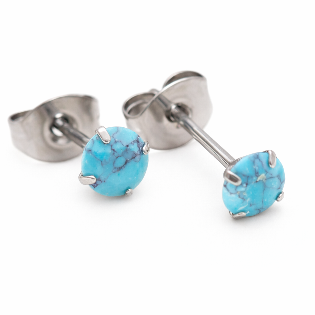 Turquoise 4mm claw set titanium stud earrings by Halobes, pair of minimalist jewelry with vibrant turquoise stones.