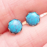 Turquoise 6mm titanium stud earrings pair by Halobes, lightweight 20g jewelry, featuring vibrant turquoise stones in classic earring style.