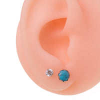 Pair of turquoise 6mm titanium stud earrings by Halobes, lightweight 20g earrings for pierced ears.