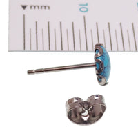 Pair of turquoise 6mm titanium stud earrings from Halobes, lightweight 20g earrings with a sleek, modern design.