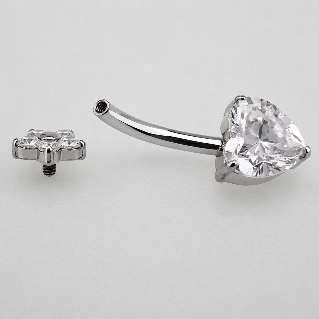 Titanium heart flower CZ belly ring with internal threading, 14g body jewelry by Body Clickers featuring a decorative floral design.