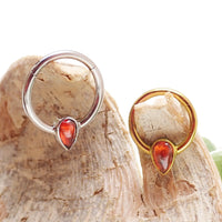 16g Magpie natural stone garnet titanium clicker earring with 8mm gemstone and sleek titanium body.