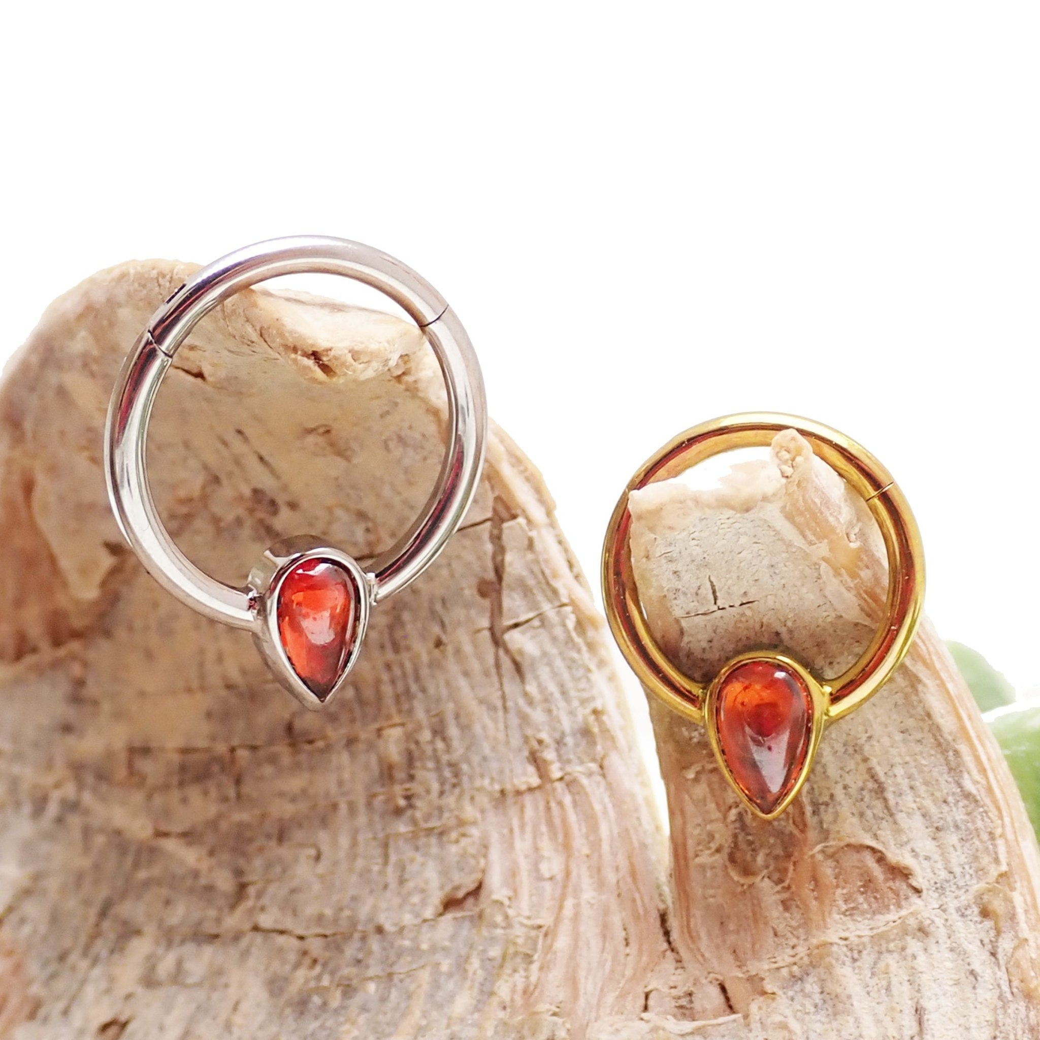 16g Magpie natural stone garnet titanium clicker earring with 8mm gemstone and sleek titanium body.