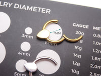 Magpie 16g natural stone tiger's eye titanium clicker with teardrop shape and 8mm size for body jewelry and piercings.