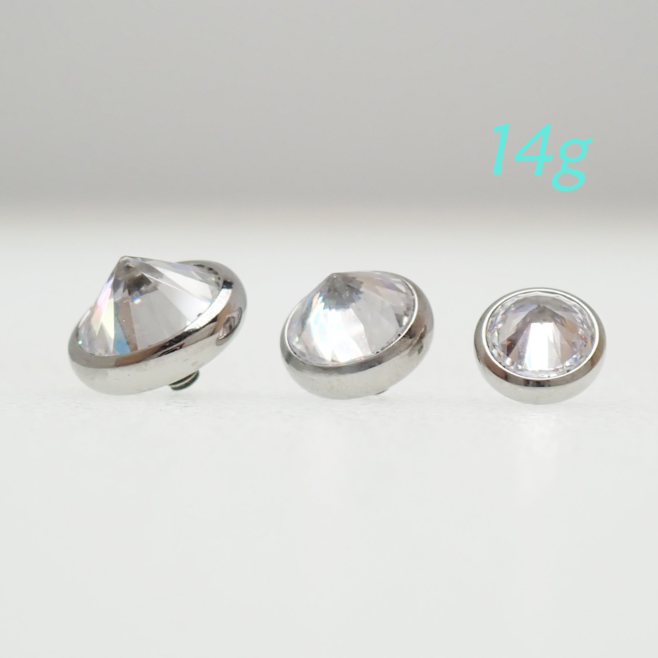 Magpie 14g internally threaded dermal top with a sparkling CZ gemstone, 1.2mm thread size, designed for body jewelry attachments.
