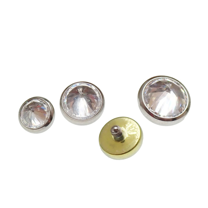 Magpie 14g internally threaded dermal top with 1.2mm CZ gemstone, designed for body jewelry attachments.