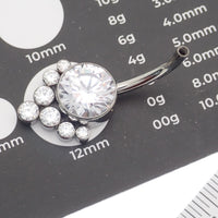 Magpie CZ titanium belly ring, 10mm to 12mm, with sparkling cubic zirconia accents, displayed on a plain background