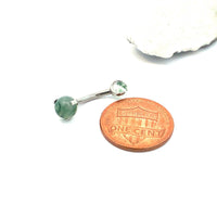Magpie Moss Agate belly curve ring, 14g, with 6mm gemstone, designed for body piercing and jewelry adornment.