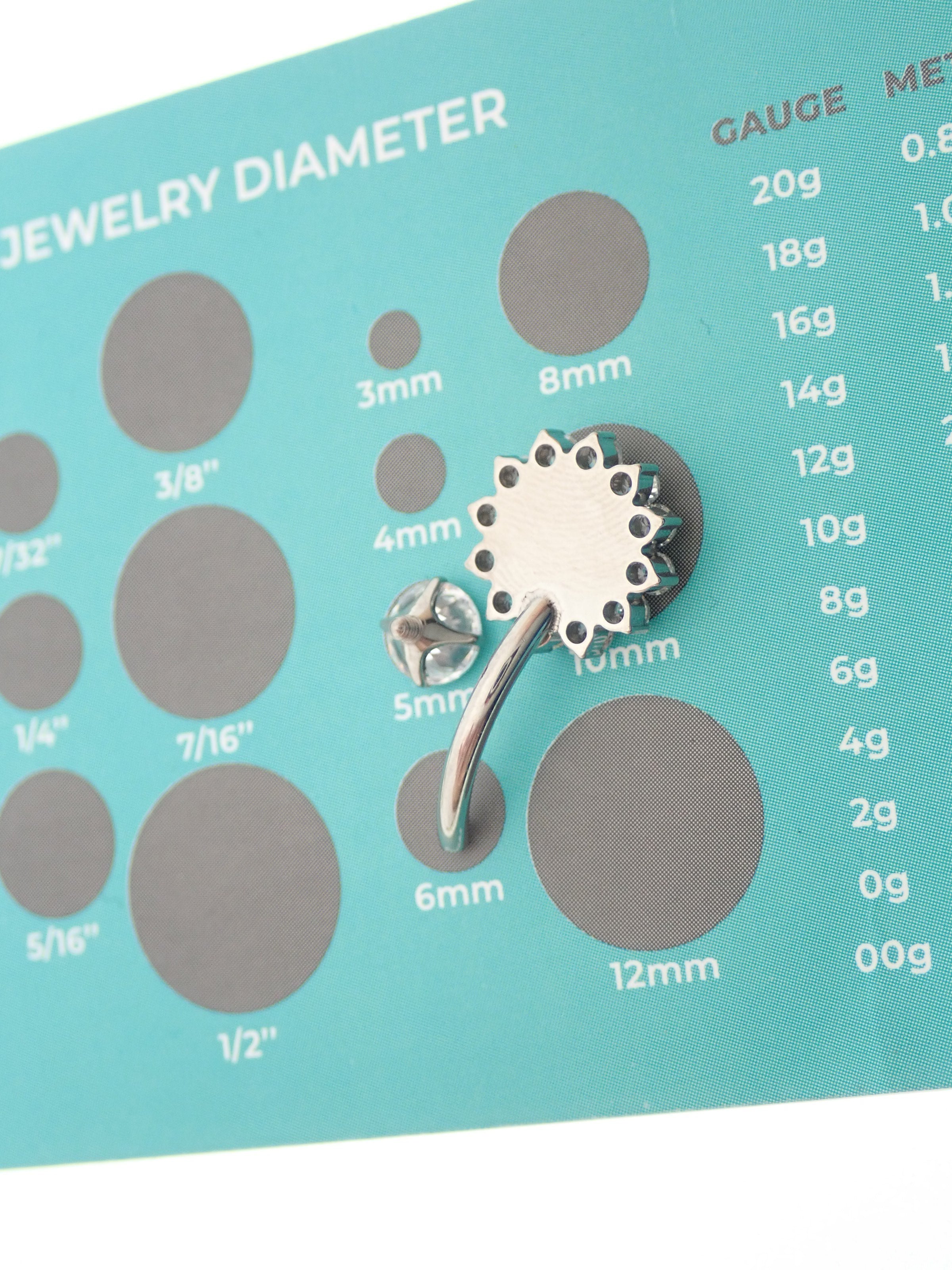 Magpie natural moss agate stone CZ belly ring in 14g with 10mm gauge, featuring a smooth polished stone and sparkling cubic zirconia accents.