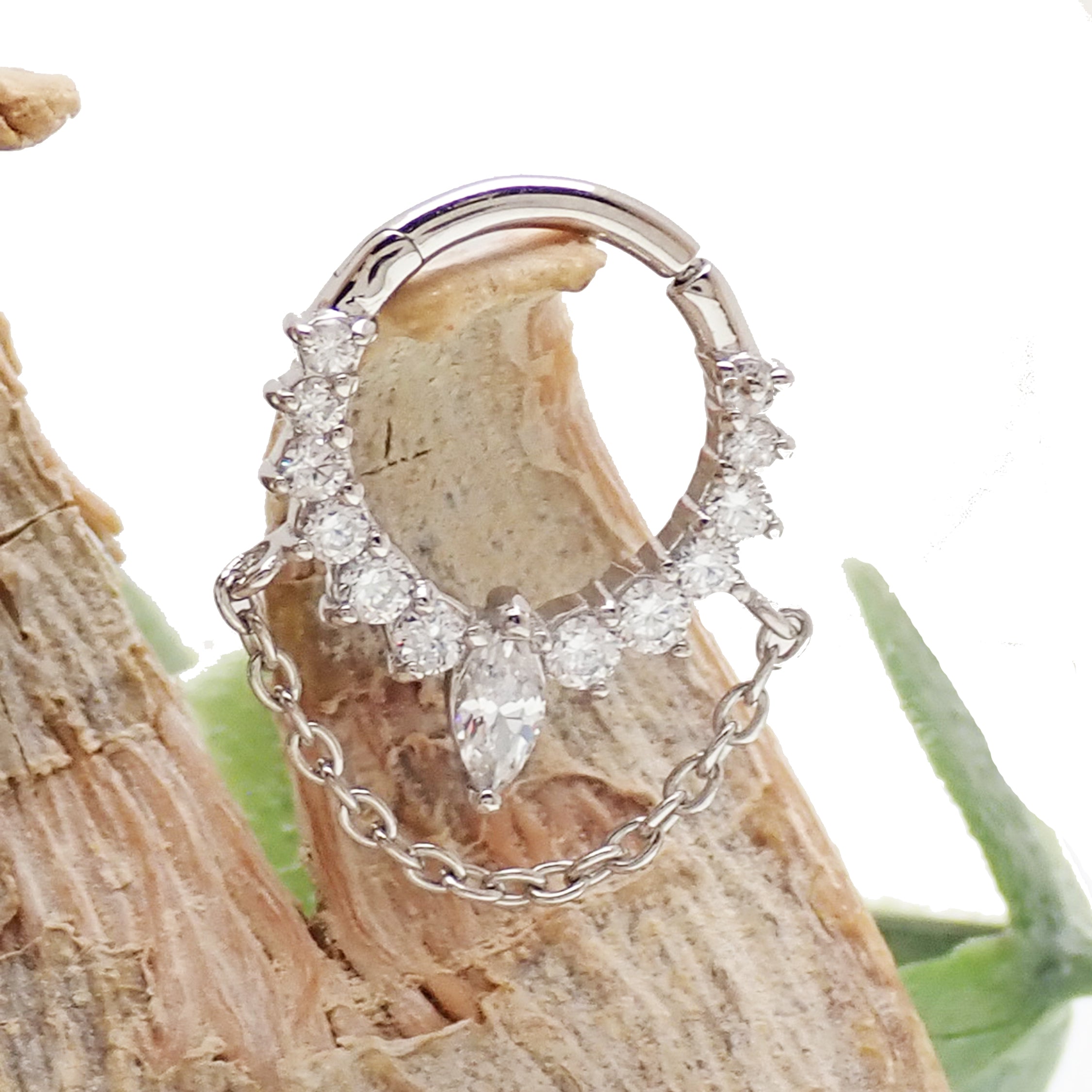 Sterling silver 925 rhodium hinged clicker earring from Magpie Body Jewelry, 8mm diameter, 16g gauge.