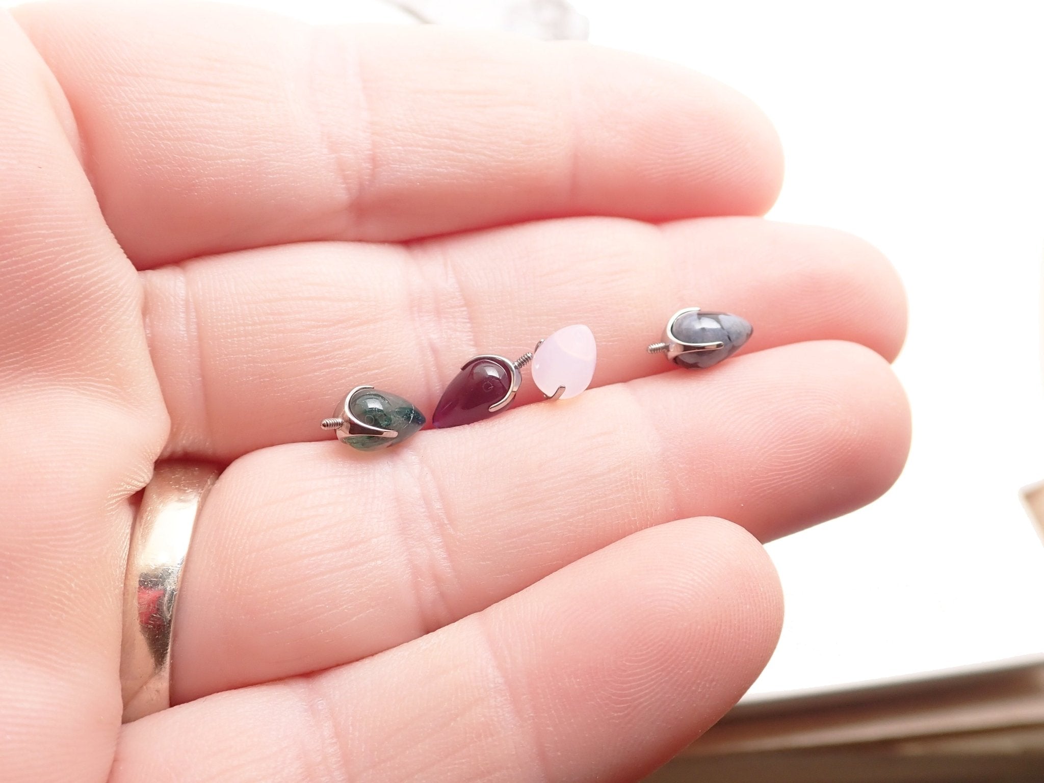 Natural stone bullet cones for body jewelry, 16g/0.9mm thread, by Magpie Body Jewelry, featuring amethyst gemstone attachments.